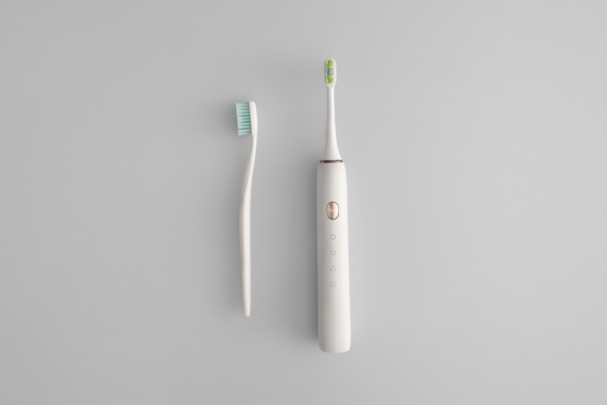 cepillo dental manual y eléctrico